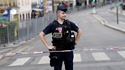 A French police officer stands guard ahead of the opening ceremony of the Paris Summer Olympics, 29 July 2024, File