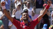 Djokovic celebrates after defeating Rafael Nadal in their men's singles second round match at the Roland Garros stadium at the 2024 Summer Olympics.
