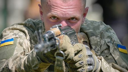 FILE: A newly recruited soldier of the 3rd assault brigade trains, in Kyiv, 17 May 2024