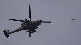 An Israeli Apache helicopter fires a missile towards the Gaza Strip, as seen from southern Israel, Tuesday, May 28, 2024.