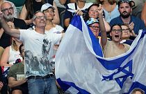 Israel fans react during the night swimming session at the 2024 Summer Olympics, Friday, Aug. 2, 2024, in Nanterre, France.