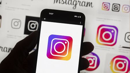 File - The Instagram logo is seen on a cell phone in Boston, Oct. 14, 2022. Former