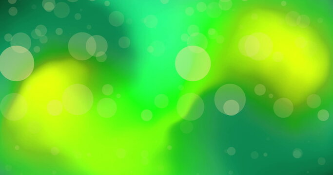 Image of yellow light spots on green background