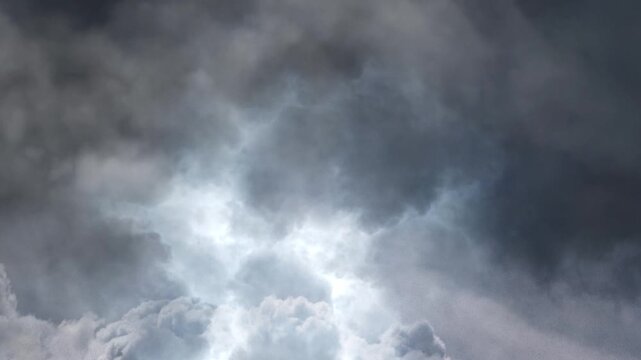 Lightning strikes on a black clouds background