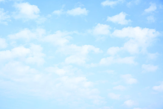 Light blue sky with clouds