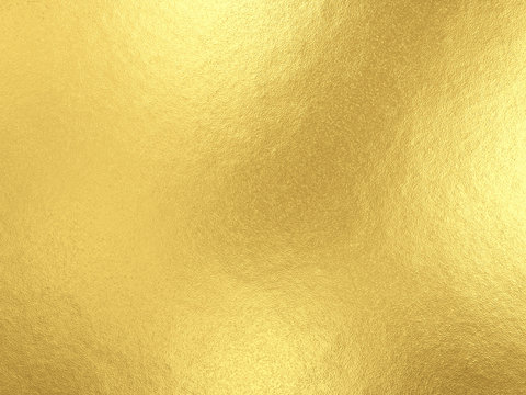 Gold foil background with light reflections