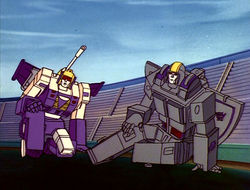 TripleTakeover Blitzwing Astrotrain stadium.jpg