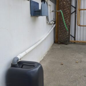 kitchen sink connected to the greywater container