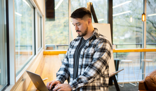 man working at laptop