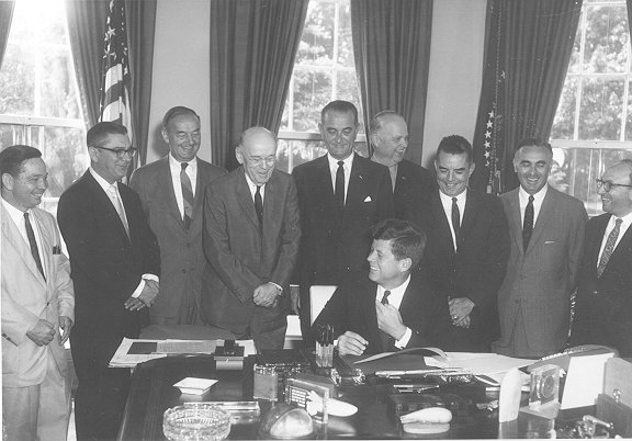 File:President Kennedy signing the 1961 Amendments into law, June 30, 1961.jpg