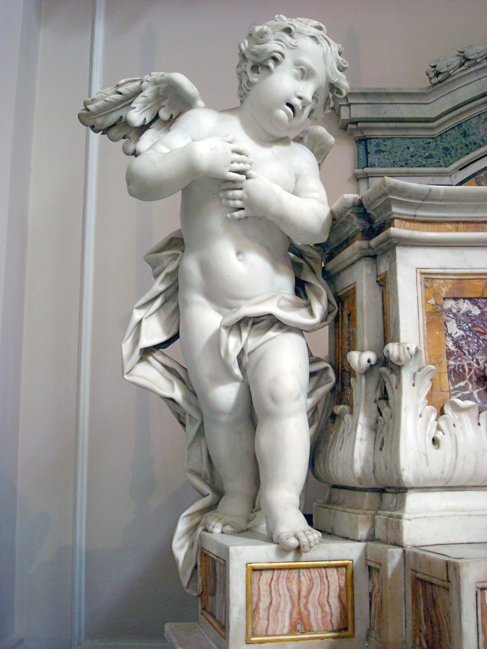 https://upload.wikimedia.org/wikipedia/commons/e/e1/Putto_Sanmartino.jpg