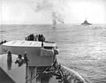 A Japanese plane plunges into the sea ahead of USS Columbia as she steams in column with other cruisers during the attack on Bougainville, 1-2 November 1943.