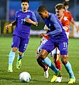 Cody Gakpo (PSV Eindhoven U19, in front) and Gablriel Culhaci (FC Utrecht U19, behind).}}