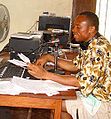 Radio newsreader in Sierra Leone