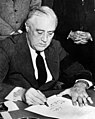Roosevelt signing the declaration of war against Japan, 1941