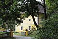 English: Number 1: Farmhouse and drive to the castle Deutsch: Nummer 1: Wirtschaftsgebäude und Einfahrt vom Schloss