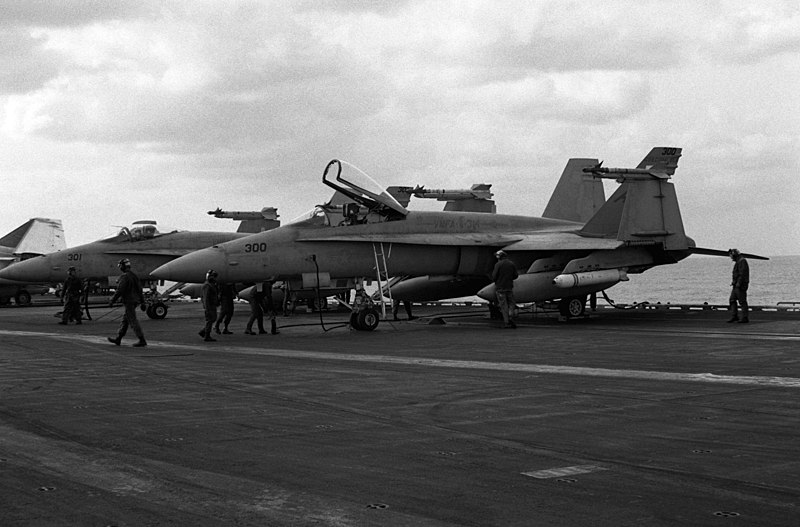 File:An F-A-18A Hornet aircraft from Marine Fighter-Attack Squadron 314 are serviced on the flight deck of the aircraft carrier USS CORAL SEA (CV 43). The aircraft in the foreground is a - DPLA - fd418fdfafab324713a0a0a4a6c3d969.jpeg