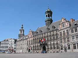 Mons, the Grand'Place with the city hall and the baroque belfry .