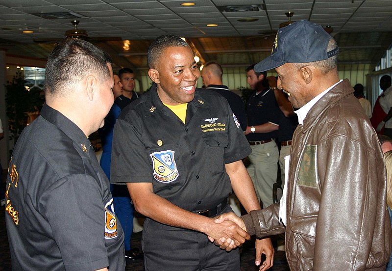 File:US Navy 050401-N-8110K-058 U.S. Navy Flight Demonstration Team Blue Angels Maintenance Master Chief, William Casttilla, left, and Command Master Chief, Kevin Harris, center, greet retired Tuskegee Airman Dick Macon.jpg