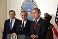 Rumsfeld and Wolfowitz stand by President George W. Bush as he announces $74.7 billion wartime supplemental budget request at the Pentagon, March 25, 2003