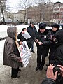 Mothers' rally. St. Petersburg, 2019-02-10. Police officer interviews protesters.