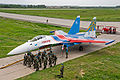 Paratroopers next to a Sukhoi Su-35