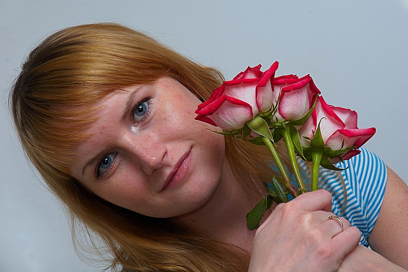 File:Russia. Portrait of female with flowers.jpg