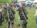 The Swedish soldier on the left foreground is carrying a Carl Gustaf recoiless rifle