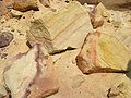 Chunks of sandstone (stained by iron-bearing weathering solutions) in talus at Makthesh Katan, Lower Cretaceous, Negev, Israel
