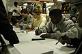 Josh Lucas, Jessica Biel, and Jamie Foxx sign autographs for USS Abraham Lincoln (CVN 72) crew members June 16, 2004