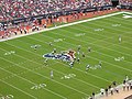 A National Football League game between the Tennessee Titans (in navy blue) and the Houston Texans (in white)