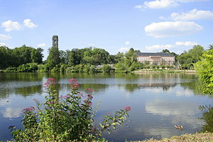 Cambron-Casteau(Belgium), the East pond, the tower (1774), the park of the former abbey and the former castle (XIXth century).