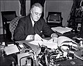 FDR signs the Lend-Lease bill