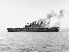 US Aircraft Carrier USS Yorktown (CV-5) burning after first Japanese aircraft attack at Midway