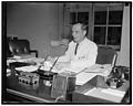 T.A.M. Craven at his desk, 1937-07-26