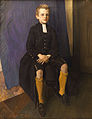 Bluecoat pupil in scool uniform with rabat (1916, England)