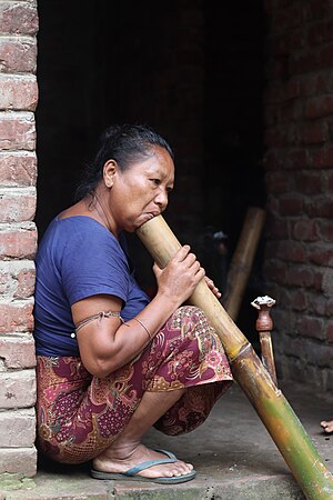 Garo woman with traditional Bamboo Hookah