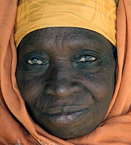 An elderly Gambian woman wearing a hijab