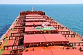 Capesize bulk carrier 'Polymnia' takes in a pilot by helicopter.