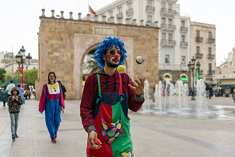 Clowns in Bab Bhar, the entry of medina of Tunis. I am nominating it because it is a non common street art there.
