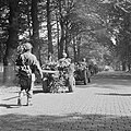 Men of the 2nd Battalion, South Staffordshire Regiment, marching with their vehicles and equipment along a road between Oosterbeek and Arnhem, 19 September 1944.
