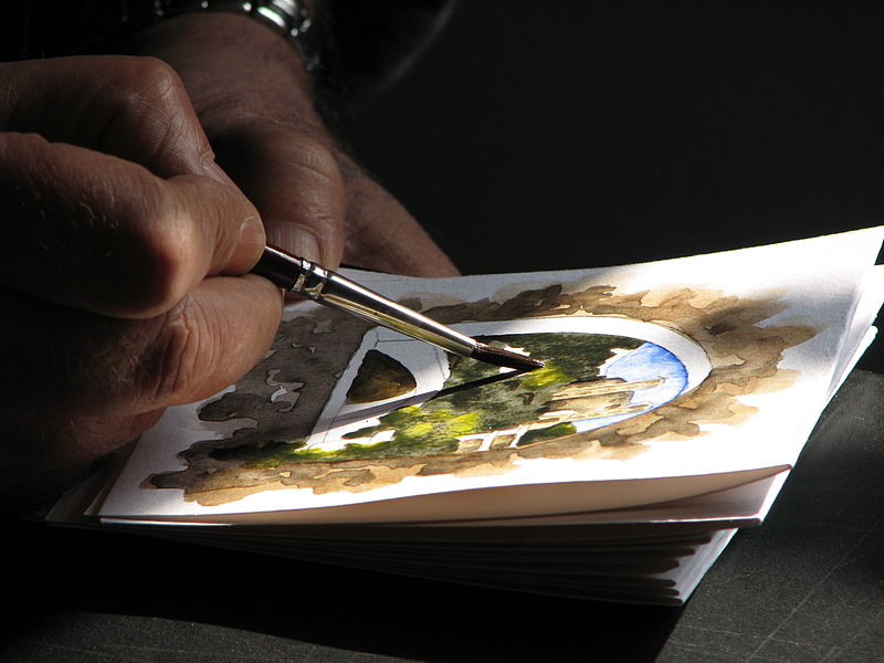 File:Dolceacqua43 - Artista locale mentre dipinge un acquarello.jpg