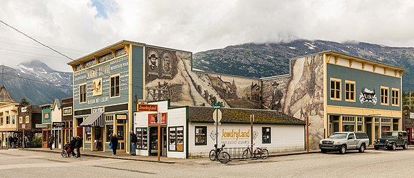 Shops in Skagway Historic District in tradicional wooden style, Alaska, United States.