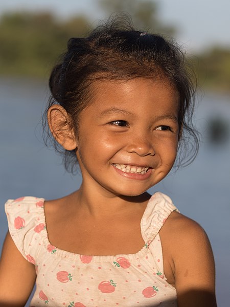 File:Young girl smiling in sunshine (2).jpg