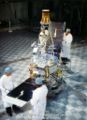 Technicians attach the solar panels on Mariner 2