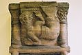 Romanesque capital representing a swimming merman, in the Unterlinden Museum of Colmar