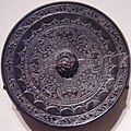 An Eastern Han Dynasty bronze mirror with incised designs