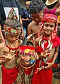 Children wearing Dayaknese traditional clothes in Nyobeng Rituals by Dayak Bidayuh tribe