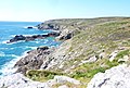 Les falaises aux alentours du port de Bestrée, lequel est visible au milieu de la photographie.