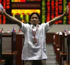 A trader at the Philippines stock exchange as business is halted